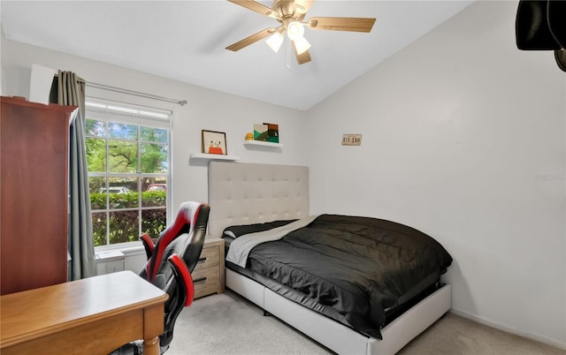 9616 River Walk Ct, Orlando, FL 32825 - bedroom featuring light colored carpet, vaulted ceiling, a desk, and a ceiling fan