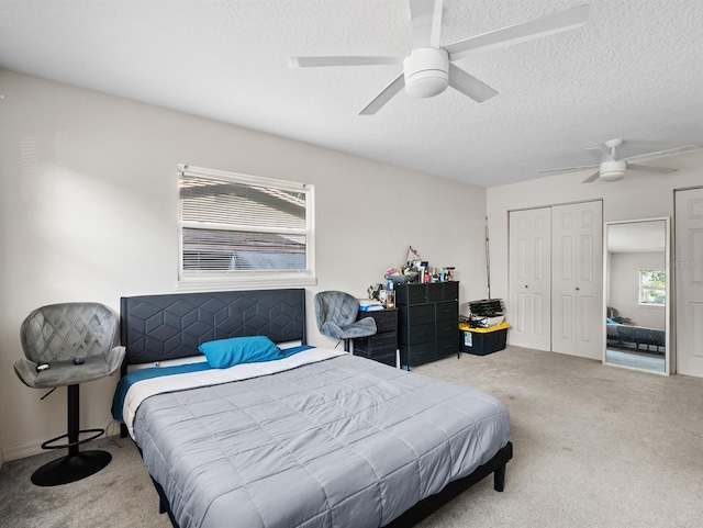 4546 Malibu St, Orlando, FL 32811 - bedroom featuring carpet, ceiling fan, and a textured ceiling