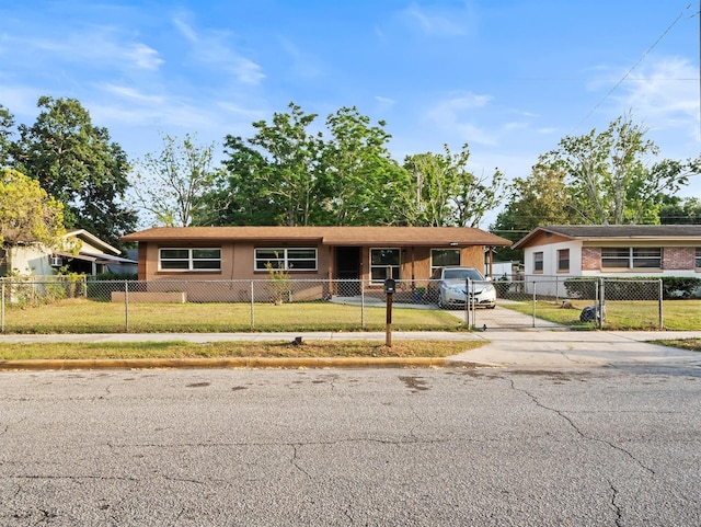 4546 Malibu St, Orlando, FL 32811 - view of front of home with concrete driveway