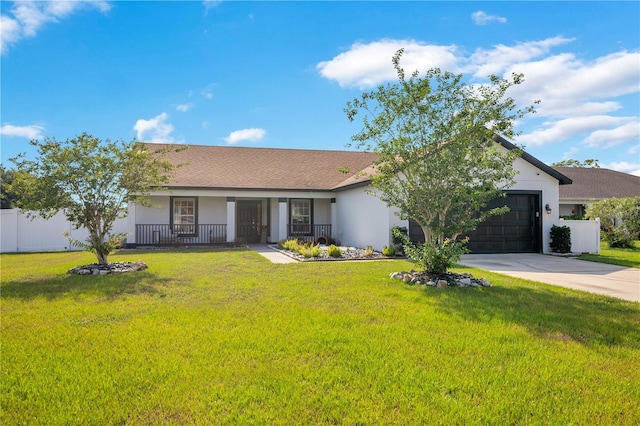 2406 Placid Way, Kissimmee, FL 34758 - single story home with concrete driveway, stucco siding, a garage, and covered porch