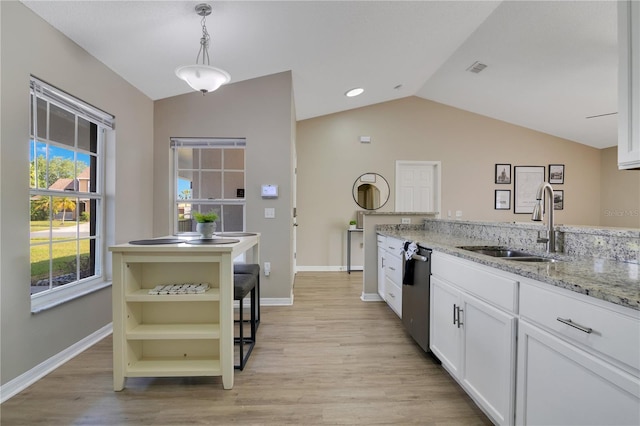 2406 Placid Way, Kissimmee, FL 34758 - kitchen featuring a sink, stainless steel dishwasher, lofted ceiling, open shelves, and light wood finished floors