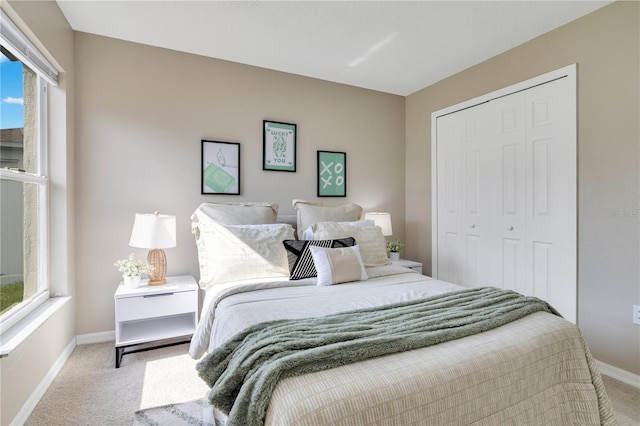 2406 Placid Way, Kissimmee, FL 34758 - carpeted bedroom featuring baseboards and a closet