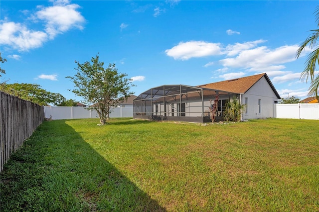 2406 Placid Way, Kissimmee, FL 34758 - view of yard featuring glass enclosure