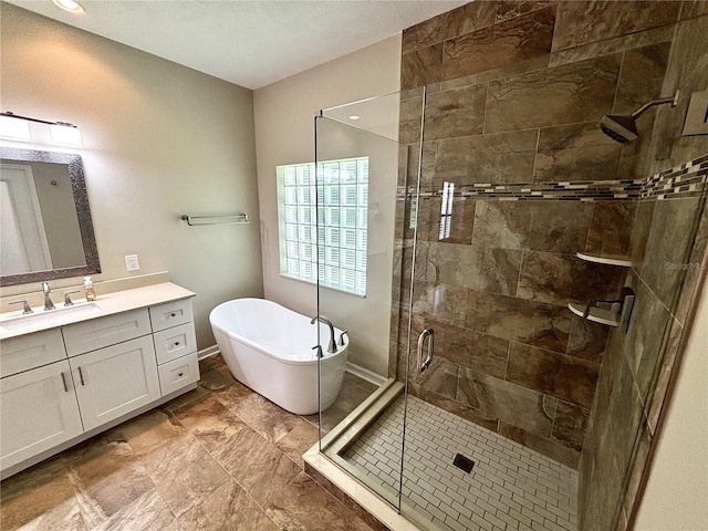563 Pleasant Grove Dr, Winter Springs, FL 32708 - full bath with vanity, a soaking tub, and a stall shower
