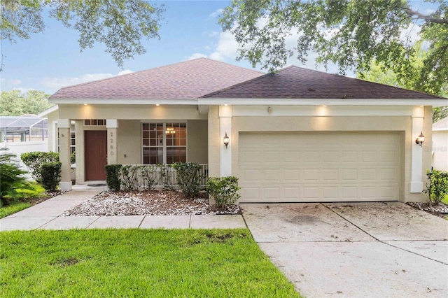 2280 Yorville Ct, Ocoee, FL 34761 - ranch-style home with a shingled roof, stucco siding, an attached garage, and driveway