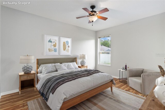 2280 Yorville Ct, Ocoee, FL 34761 - bedroom with wood finished floors and ceiling fan
