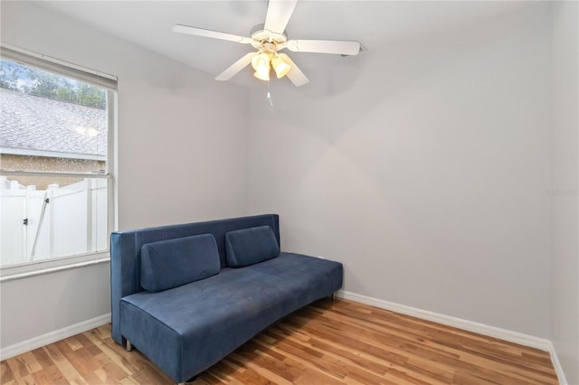 2280 Yorville Ct, Ocoee, FL 34761 - sitting room with wood finished floors and ceiling fan