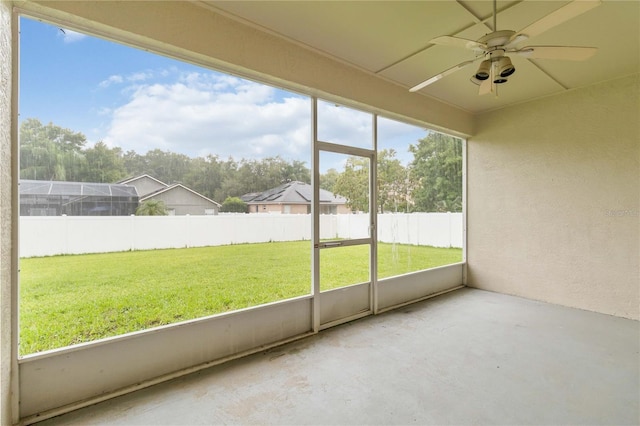 2280 Yorville Ct, Ocoee, FL 34761 - unfurnished sunroom featuring a ceiling fan