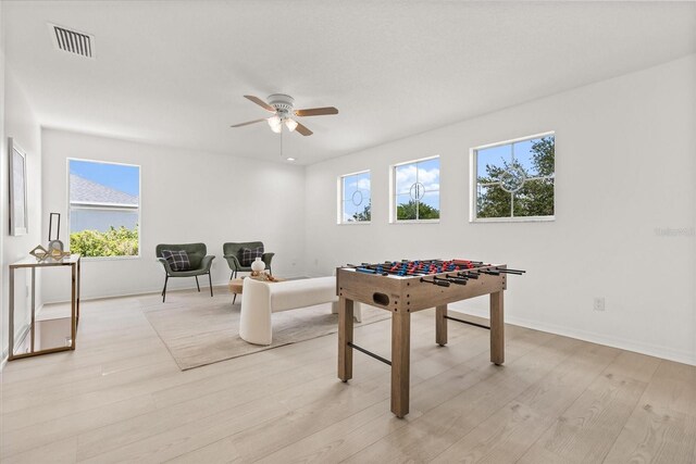 14927 Faversham Cir, Orlando, FL 32826 - game room with a ceiling fan, light wood finished floors, and baseboards