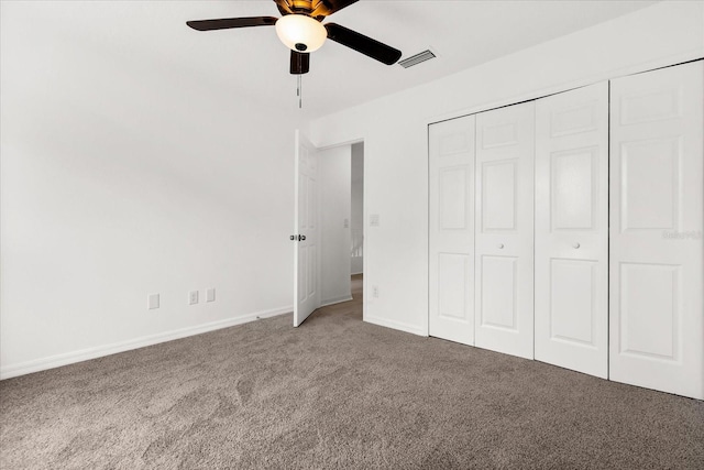 14927 Faversham Cir, Orlando, FL 32826 - unfurnished bedroom featuring carpet floors, baseboards, a closet, and ceiling fan