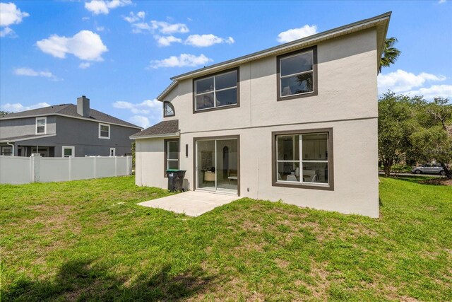 14927 Faversham Cir, Orlando, FL 32826 - back of house featuring stucco siding