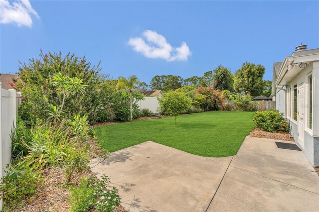 8134 Hook Cir, Orlando, FL 32836 - view of yard featuring a patio