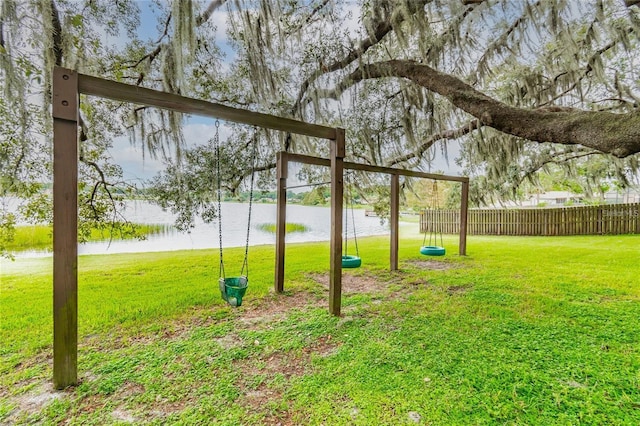8134 Hook Cir, Orlando, FL 32836 - view of yard with a playground and a water view