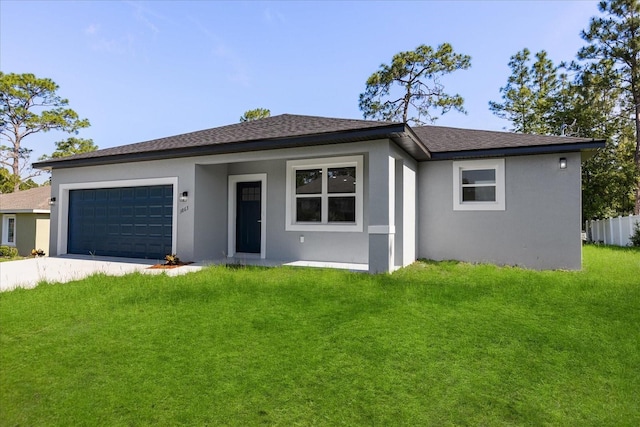 3863 W Galleon St, Dunnellon, FL 34433 - view of front of house with stucco siding, driveway, an attached garage, a front yard, and a shingled roof