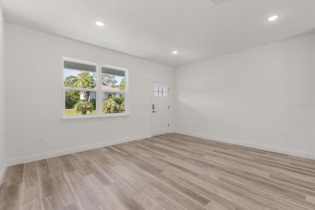 3863 W Galleon St, Dunnellon, FL 34433 - spare room with light wood-type flooring, recessed lighting, and baseboards