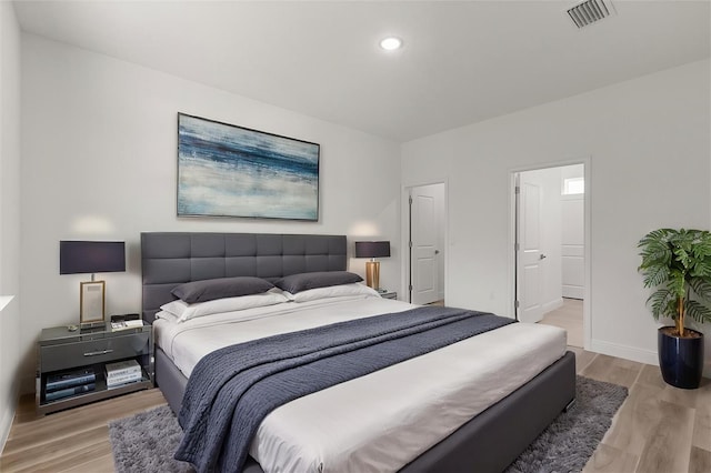 3863 W Galleon St, Dunnellon, FL 34433 - bedroom featuring light wood-type flooring, baseboards, and recessed lighting