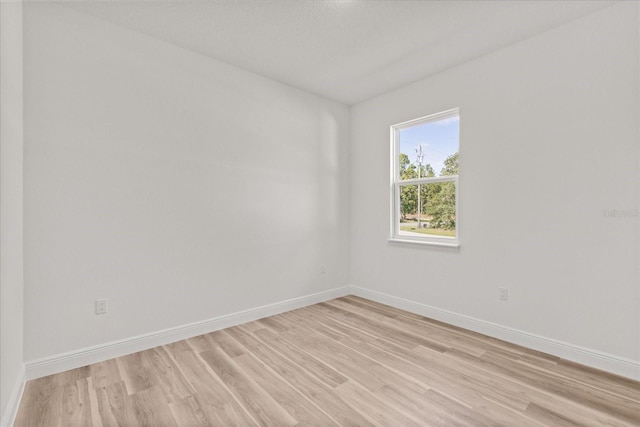3863 W Galleon St, Dunnellon, FL 34433 - spare room featuring light wood-type flooring and baseboards