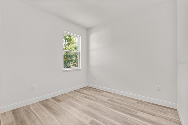 3863 W Galleon St, Dunnellon, FL 34433 - empty room with light wood finished floors and baseboards