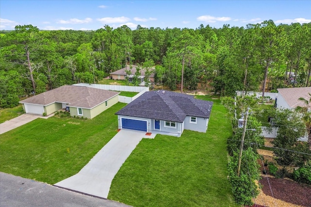 3863 W Galleon St, Dunnellon, FL 34433 - view of subject property with a heavily wooded area