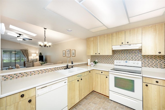 3033 Dunhill Dr, Cocoa, FL 32926 - kitchen with white appliances, light brown cabinetry, a sink, and under cabinet range hood