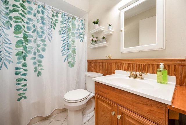 3033 Dunhill Dr, Cocoa, FL 32926 - bathroom featuring vanity, toilet, tile patterned floors, and curtained shower
