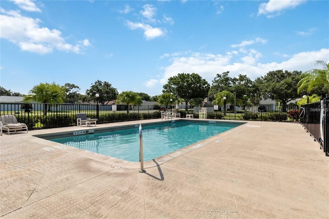 3033 Dunhill Dr, Cocoa, FL 32926 - community pool featuring a patio area
