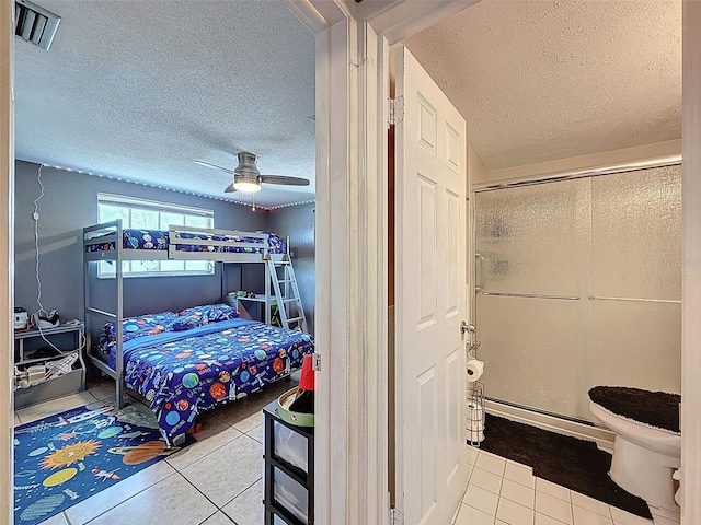 5415 Riddle Rd, Holiday, FL 34690 - tiled bedroom with a textured ceiling, a baseboard radiator, and ceiling fan