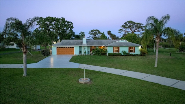 775 Bay Dr, New Smyrna Beach, FL 32168 - ranch-style home with a garage, a front lawn, concrete driveway, and a chimney