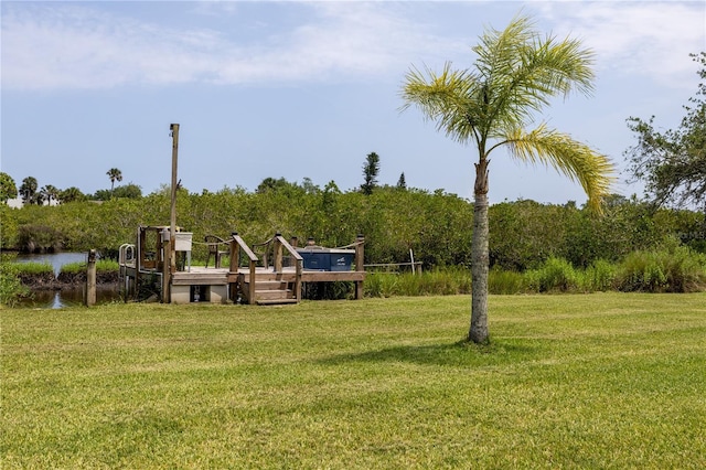775 Bay Dr, New Smyrna Beach, FL 32168 - view of green lawn with a water view