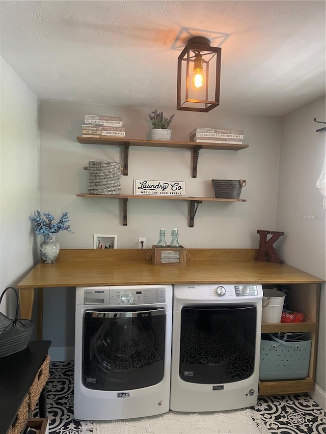 775 Bay Dr, New Smyrna Beach, FL 32168 - washroom featuring washing machine and clothes dryer and baseboards