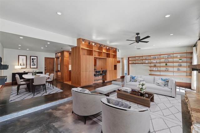 6327 Ridgeberry Dr, Orlando, FL 32819 - living room with a ceiling fan, recessed lighting, and concrete flooring