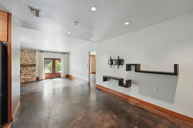 6327 Ridgeberry Dr, Orlando, FL 32819 - unfurnished living room featuring finished concrete floors and recessed lighting