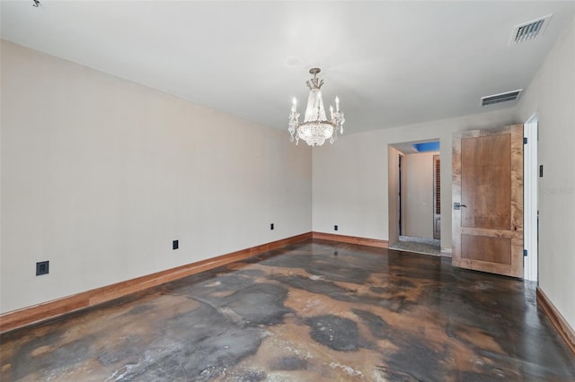 6327 Ridgeberry Dr, Orlando, FL 32819 - empty room featuring concrete flooring and a chandelier