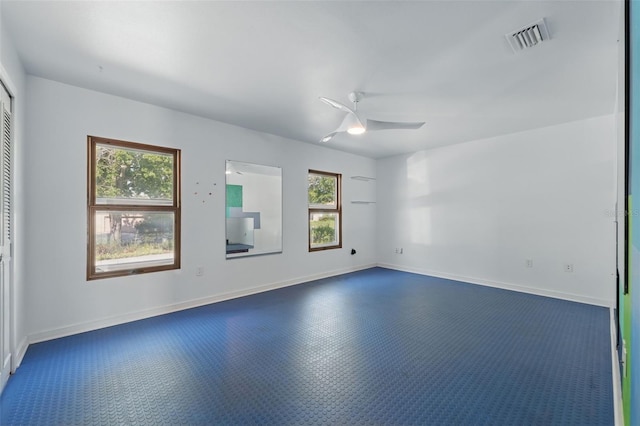 6327 Ridgeberry Dr, Orlando, FL 32819 - spare room featuring healthy amount of natural light and ceiling fan