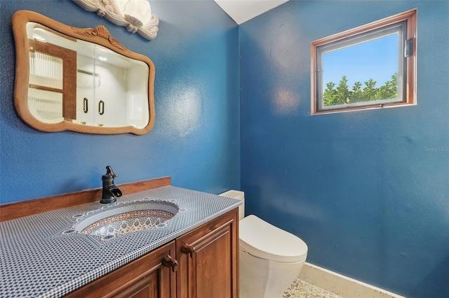 6327 Ridgeberry Dr, Orlando, FL 32819 - bathroom featuring toilet and vanity