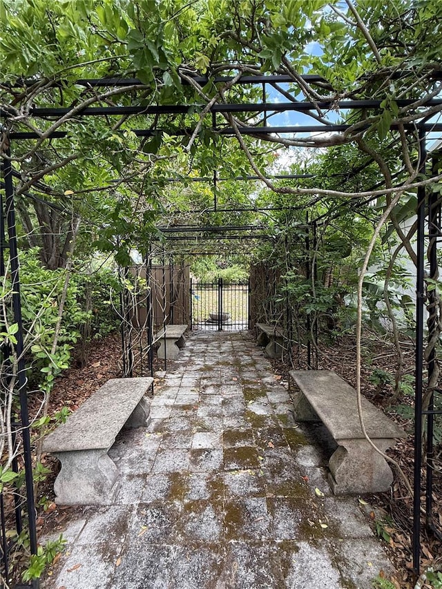 6327 Ridgeberry Dr, Orlando, FL 32819 - view of patio featuring a gate