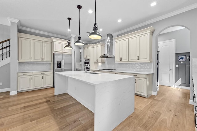 808 Sherbourne Cir, Lake Mary, FL 32746 - kitchen with wall chimney exhaust hood, a sink, crown molding, arched walkways, and tasteful backsplash