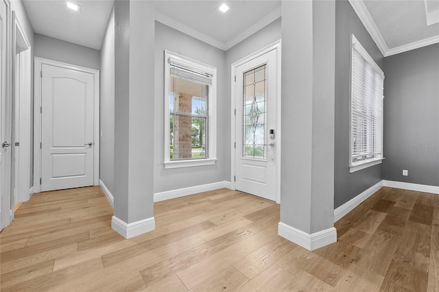 808 Sherbourne Cir, Lake Mary, FL 32746 - entryway with light wood-type flooring, ornamental molding, and baseboards