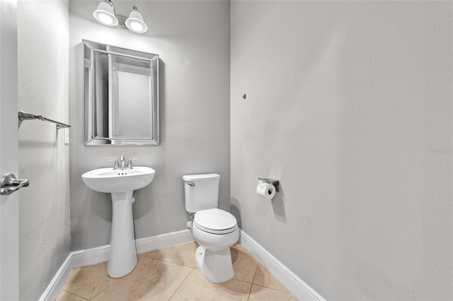 808 Sherbourne Cir, Lake Mary, FL 32746 - half bath featuring tile patterned flooring, toilet, and baseboards
