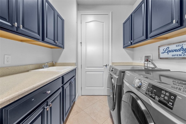 808 Sherbourne Cir, Lake Mary, FL 32746 - laundry area featuring independent washer and dryer, cabinet space, and light tile patterned floors