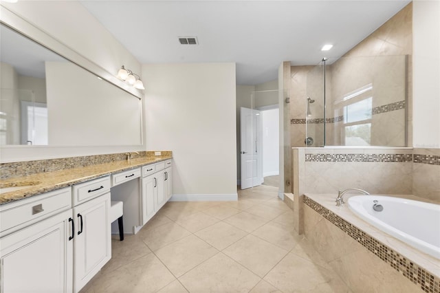 808 Sherbourne Cir, Lake Mary, FL 32746 - full bathroom with double vanity, a shower stall, a bath, tile patterned floors, and baseboards