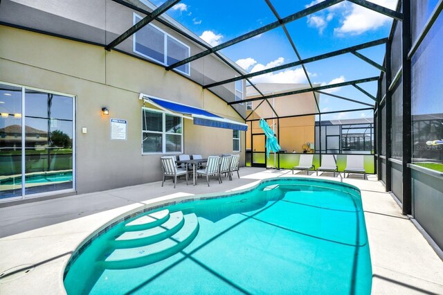 2209 Crofton Ave, Davenport, FL 33837 - outdoor pool featuring a patio and a lanai