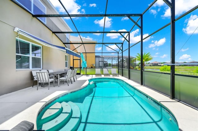 2209 Crofton Ave, Davenport, FL 33837 - outdoor pool featuring a patio area and glass enclosure