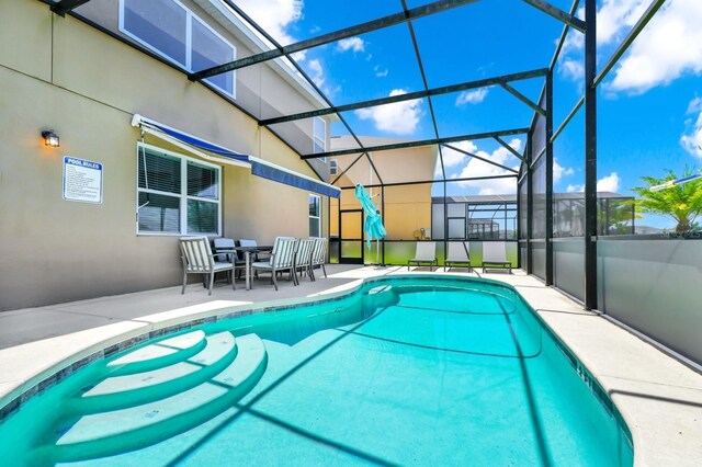 2209 Crofton Ave, Davenport, FL 33837 - swimming pool featuring a patio and a lanai