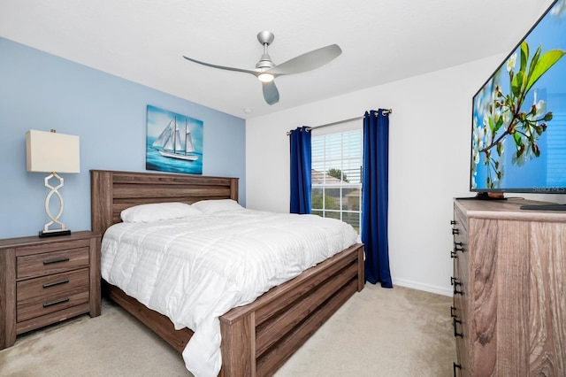 2209 Crofton Ave, Davenport, FL 33837 - bedroom featuring light colored carpet, ceiling fan, and baseboards