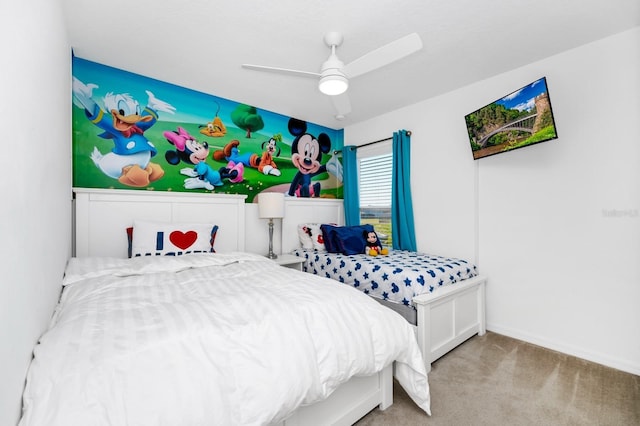 2209 Crofton Ave, Davenport, FL 33837 - carpeted bedroom with baseboards and ceiling fan