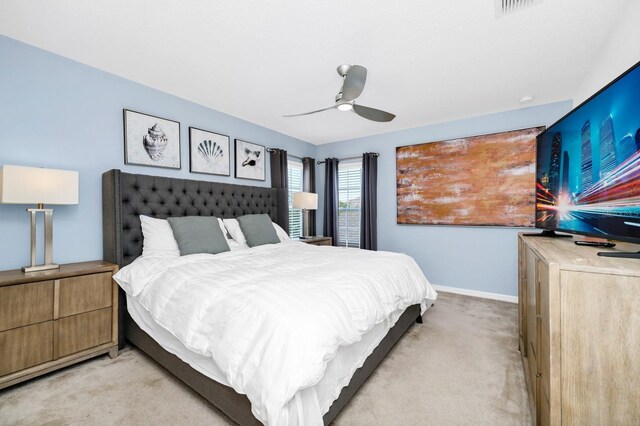 2209 Crofton Ave, Davenport, FL 33837 - bedroom featuring light carpet and ceiling fan