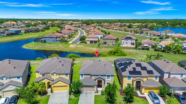2209 Crofton Ave, Davenport, FL 33837 - aerial perspective of suburban area with a large body of water