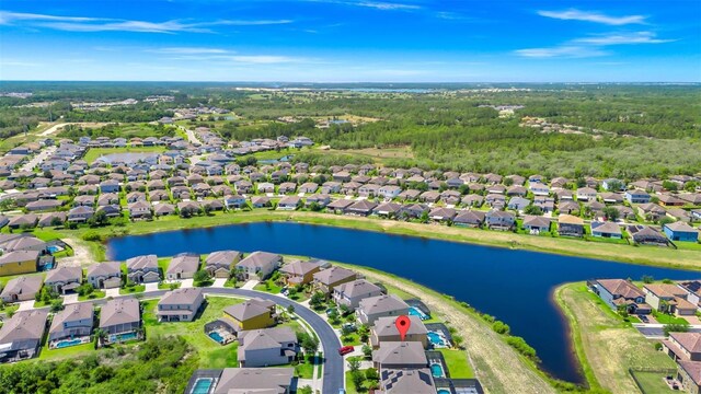 2209 Crofton Ave, Davenport, FL 33837 - aerial view of property and surrounding area featuring nearby suburban area and a large body of water