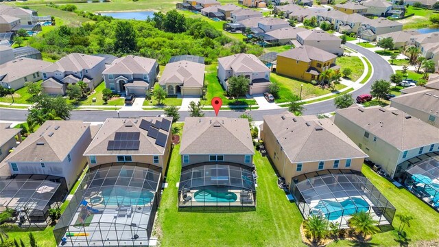 2209 Crofton Ave, Davenport, FL 33837 - aerial view of residential area with a pool area and a nearby body of water